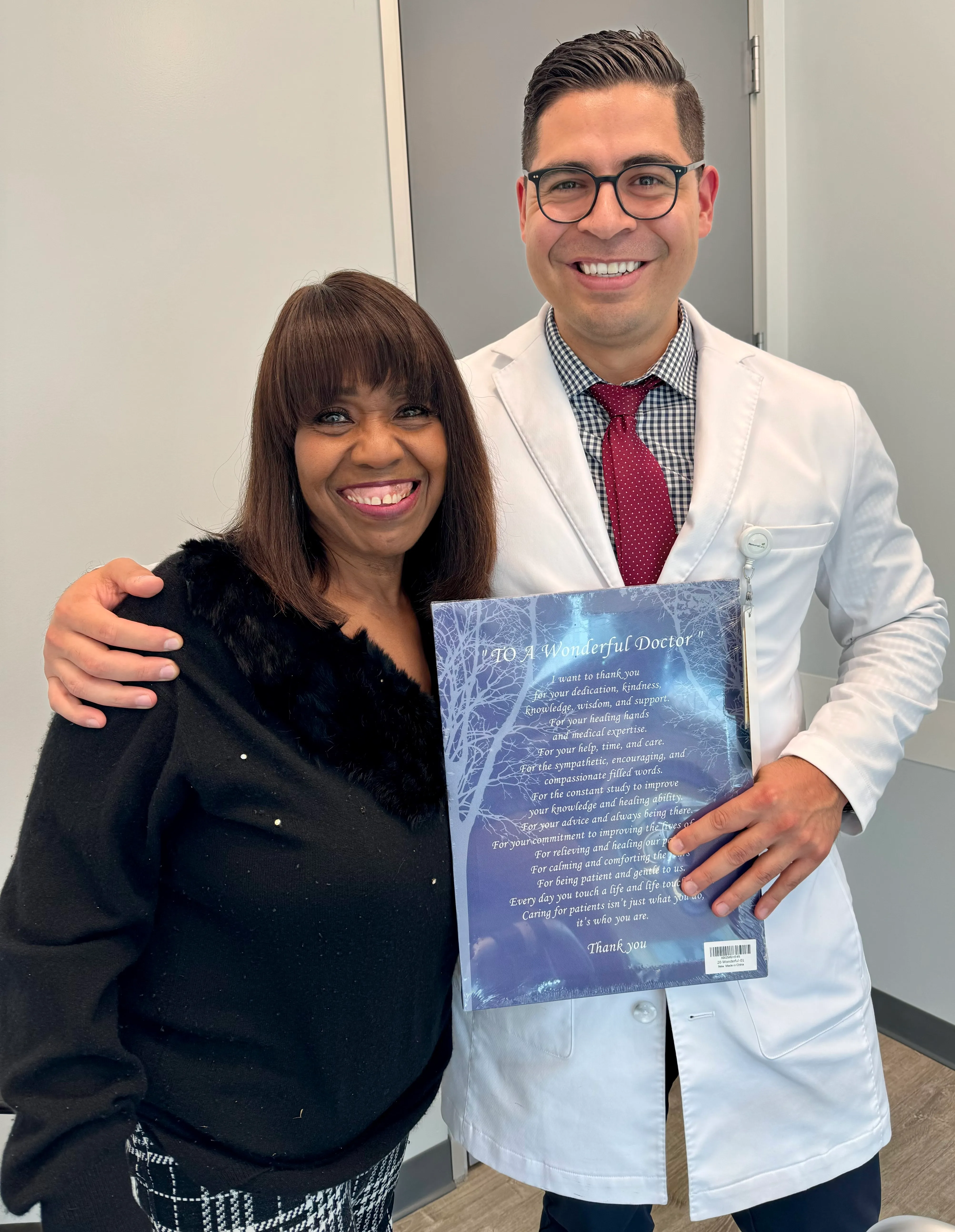 Sherry with Dr. Brandon A. Ortega after her spine surgery
